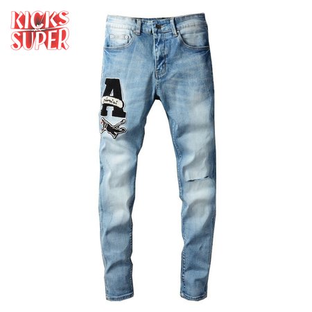 Amiri Logo Patch Rip Jeans Blue